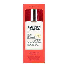 Everyday Humans Sunglazed SPF30 Sunscreen Glow Oil bottle in a red box