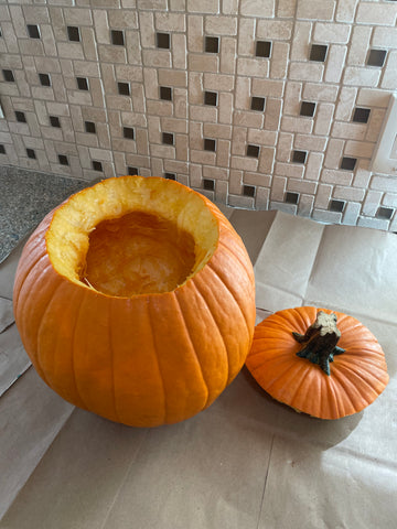 Cut the top off the pumpkin and scoop it out