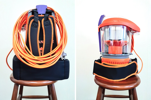Rugged Advantage bagless backpack vacuum on a stool with the cord draped over the vacuum cleaner's frame