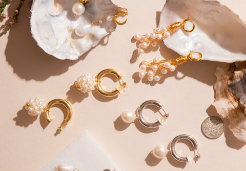 An assortment of gold, silver and pearl jewellery