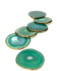 Turquoise colored agate coasters with gold plating around it