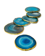 blue agate coasters with luxurious gold plating around it