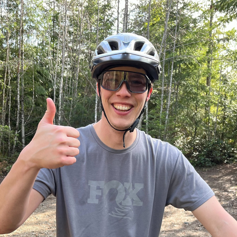 A stoked customed wearing the biking glasses