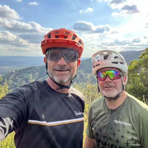 two guys wearing biking glasses on a ride