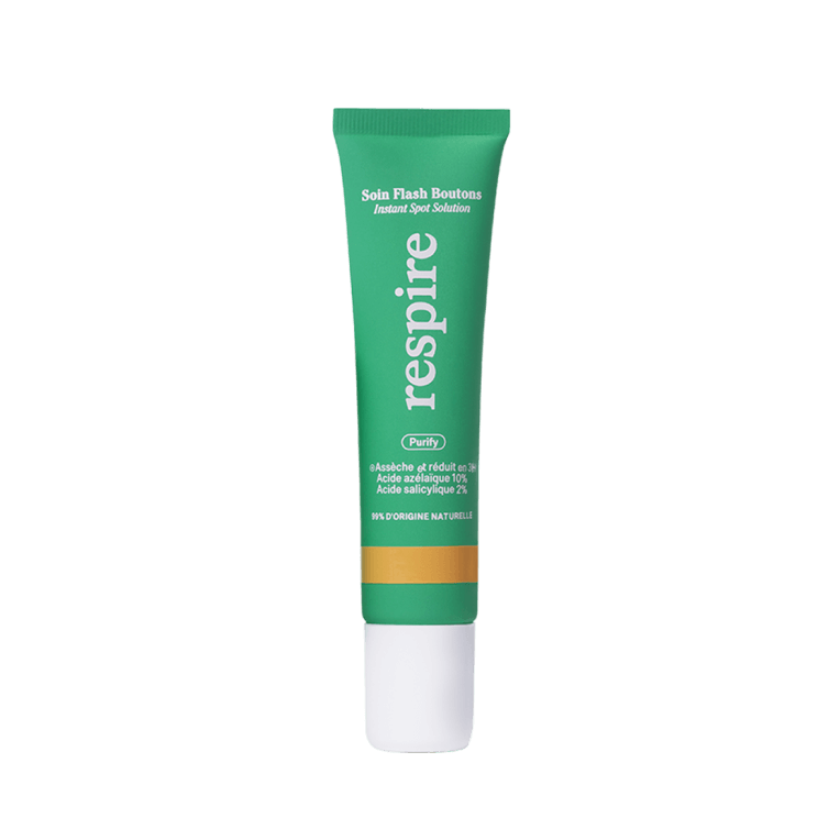 Green tube of 'Respire' instant spot solution skincare product.