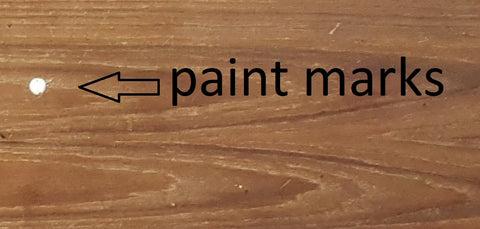 paint marks on teak coffee table