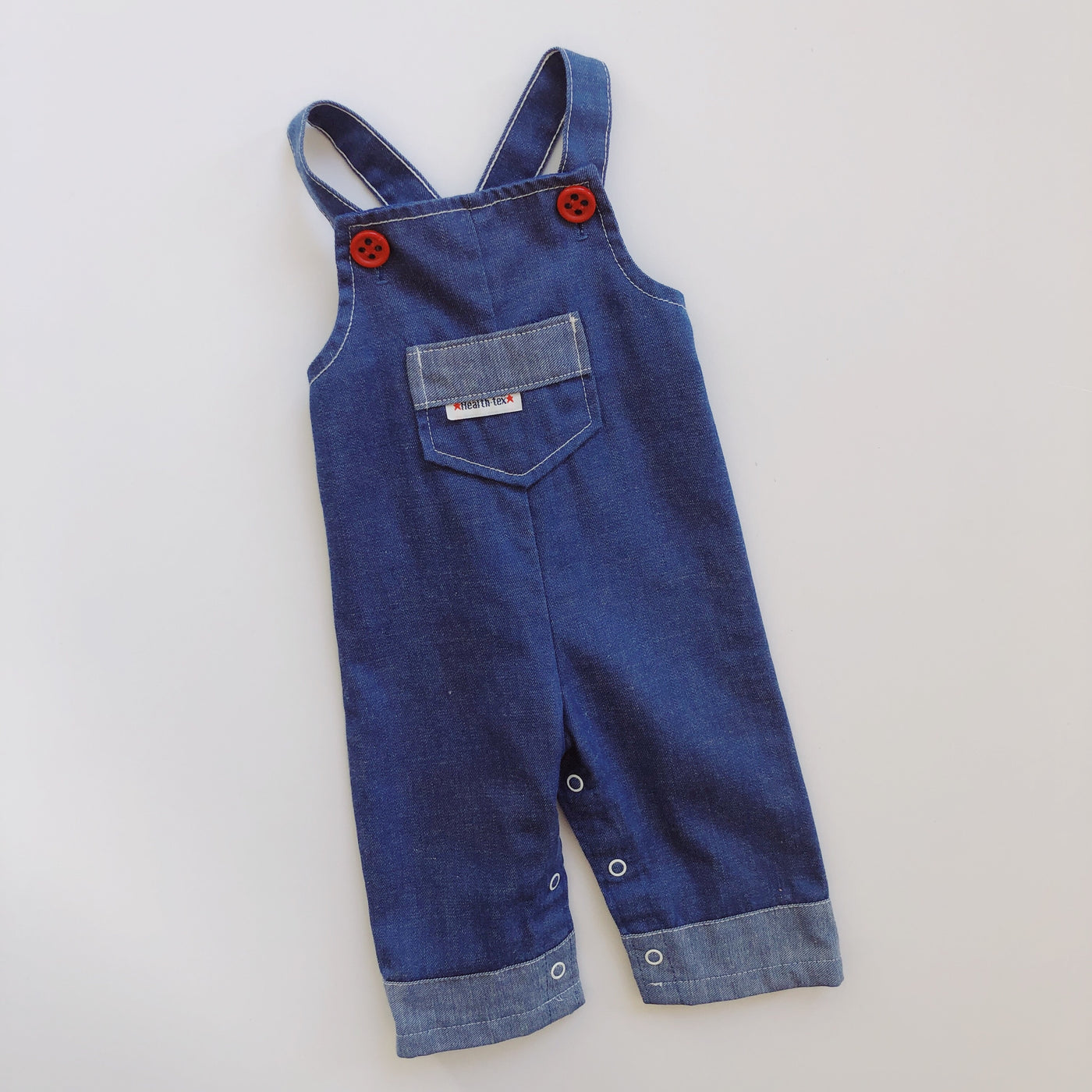 red baggy overalls