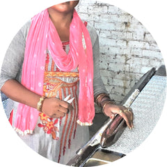 Indian Artisan Working at a Loom