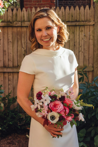 The beautiful bride Sara in the Camilyn Beth Cheri Dress in Ivory. 