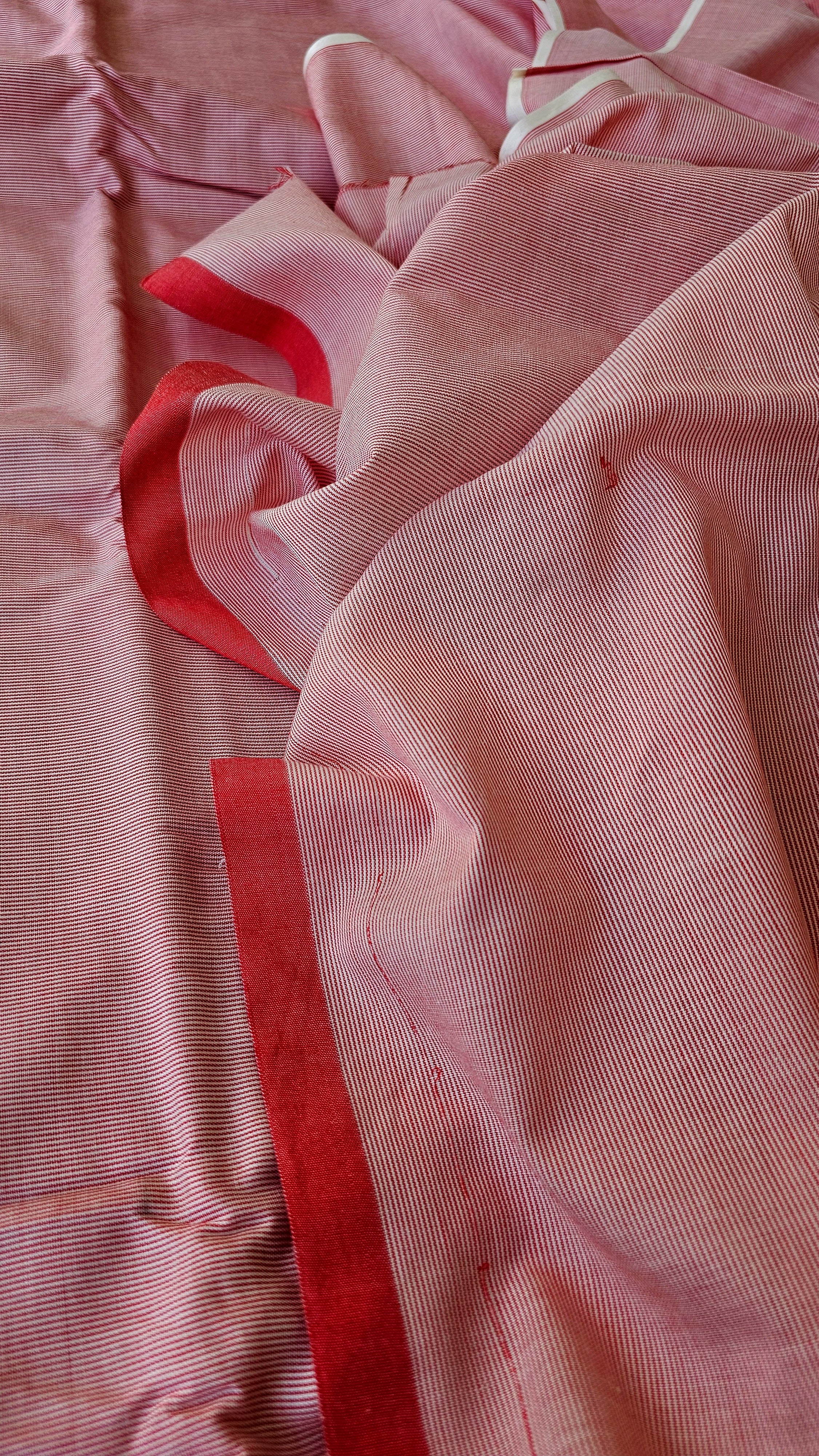 Pure Cotton Fabric with Red and White Warp Stripes.