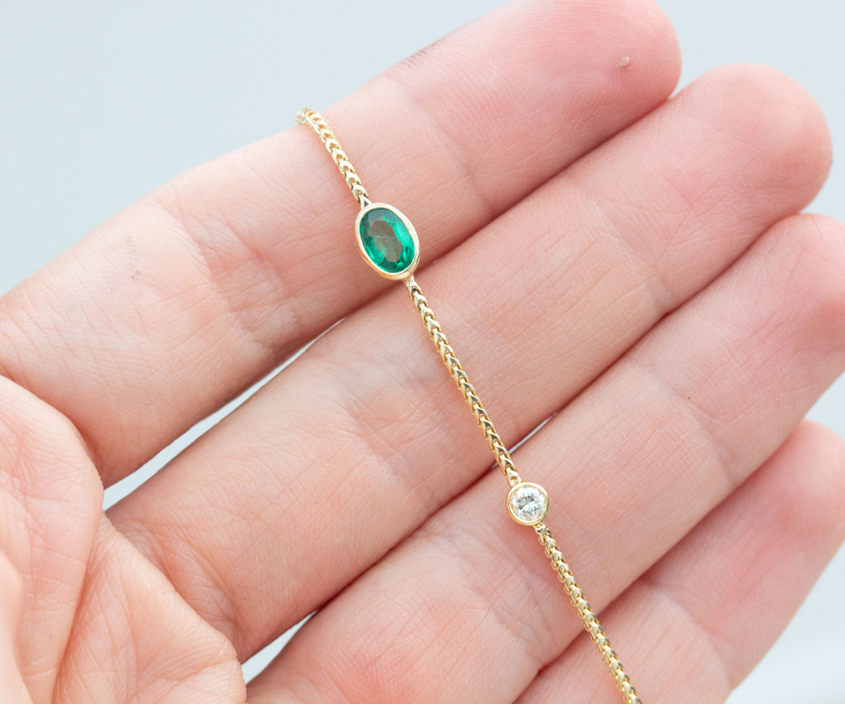 Emerald and diamond necklace delicate chain bezel set