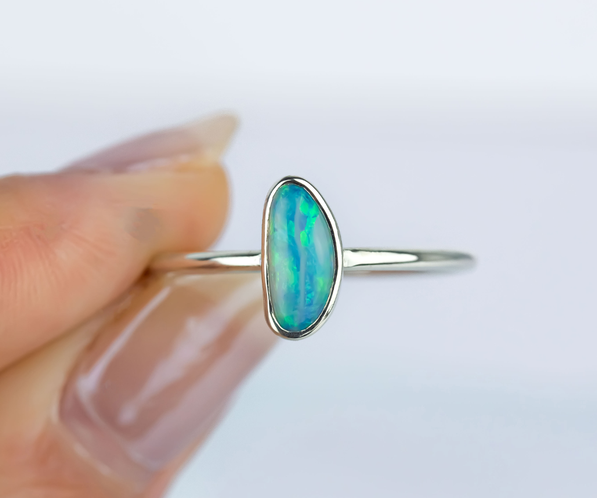 small crystal opal ring in white gold