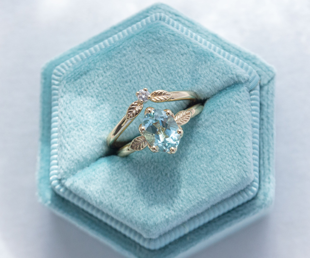 Aquamarine leaf inspired bridal ring set in 9k yellow gold