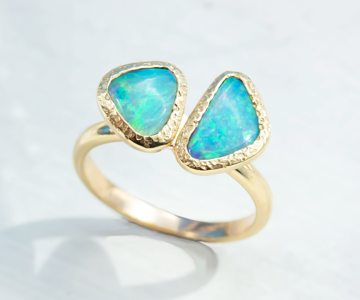 double crystal opal ring with heavy hammered bezel in yellow gold