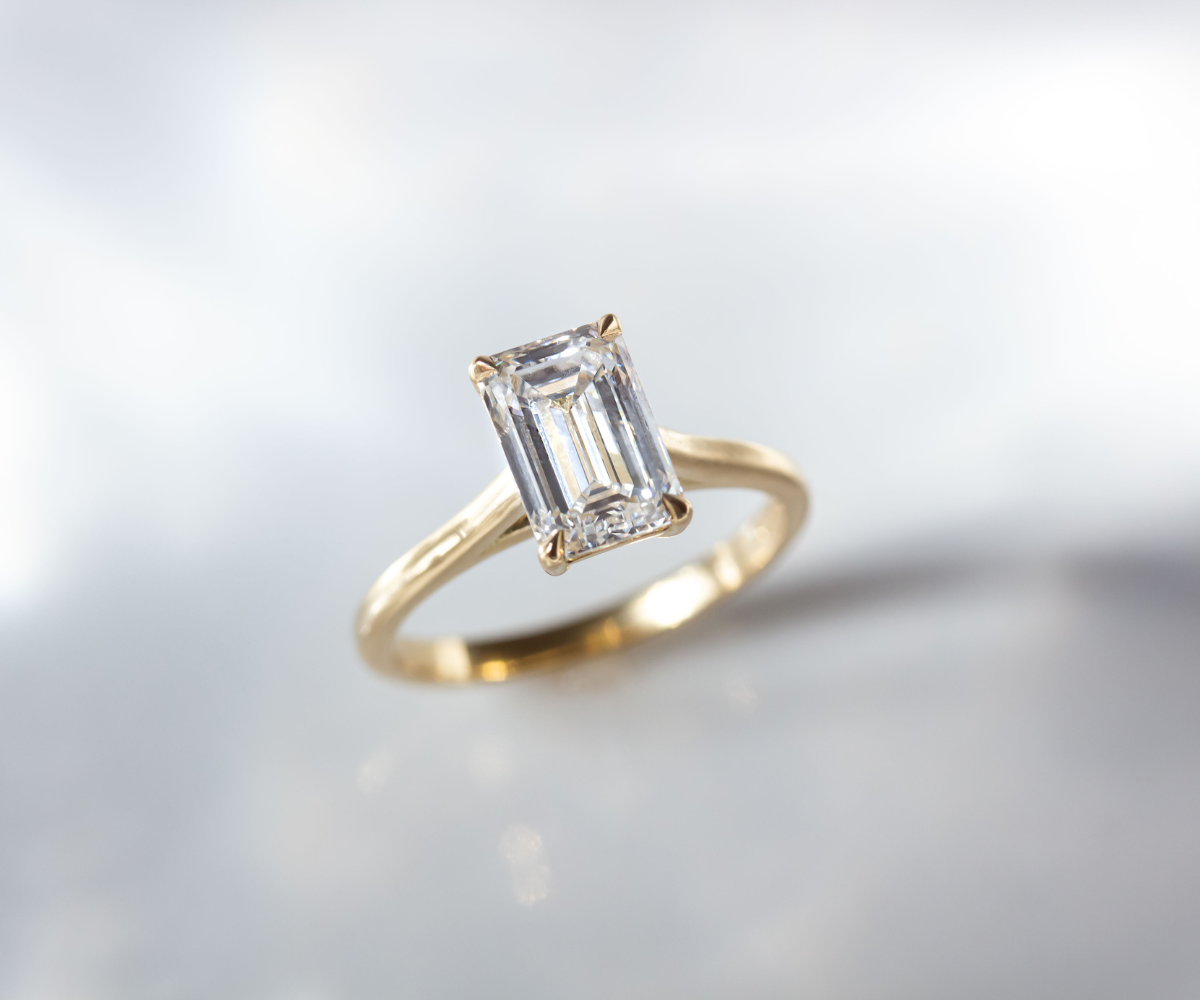 Emerald cut Solitaire Diamond Ring in 18K Yellow Gold