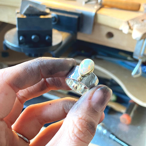 Opal gold and silver band on the workbench