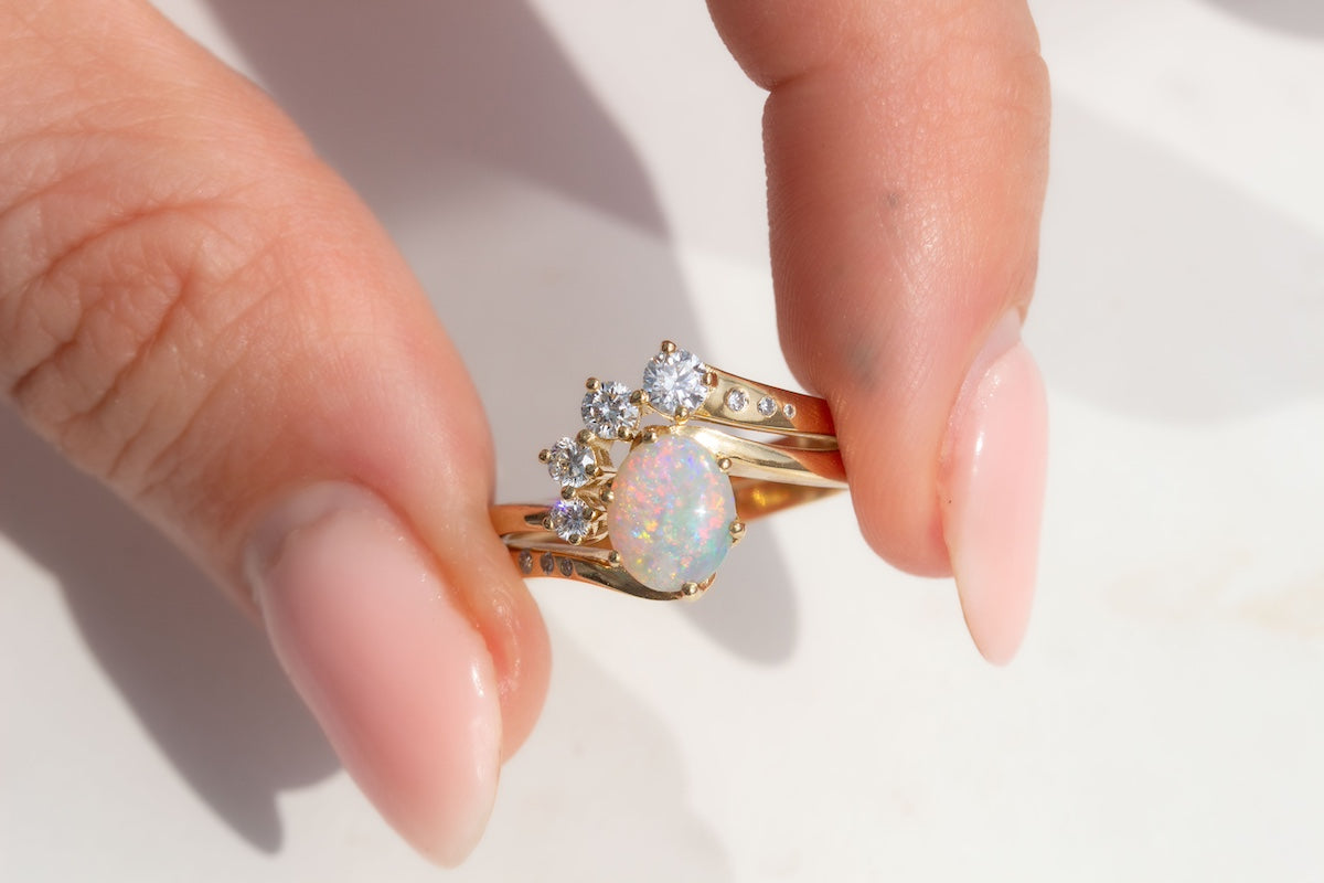 Multicoloured oval opal bridal ring set with diamond fitted band