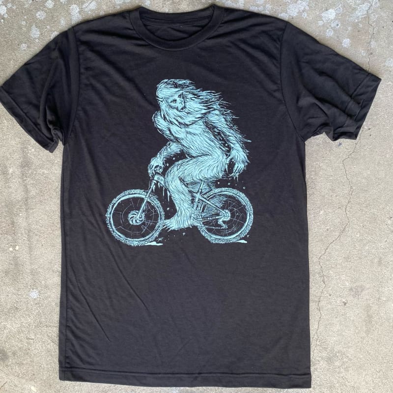 https://cdn.shopify.com/s/files/1/0069/3462/products/yeti-on-a-bicycle-mens-shirt-hoodie-land-unisex-tees-dark-cycle-clothing-black-baby-toddler-118.jpg