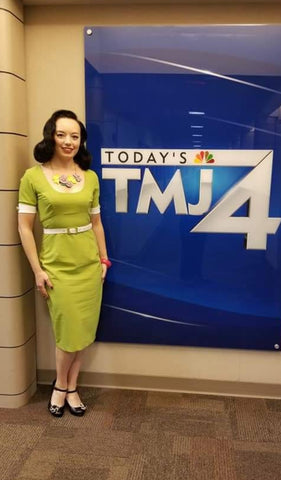 Pinup model and Hollyville owner, Pamela Marie wearing a chartreuse wiggle dress for her appearance on The Morning Blend.