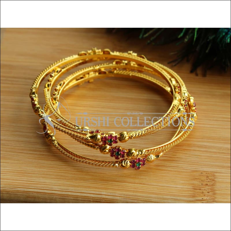 Gold plated store bangles set