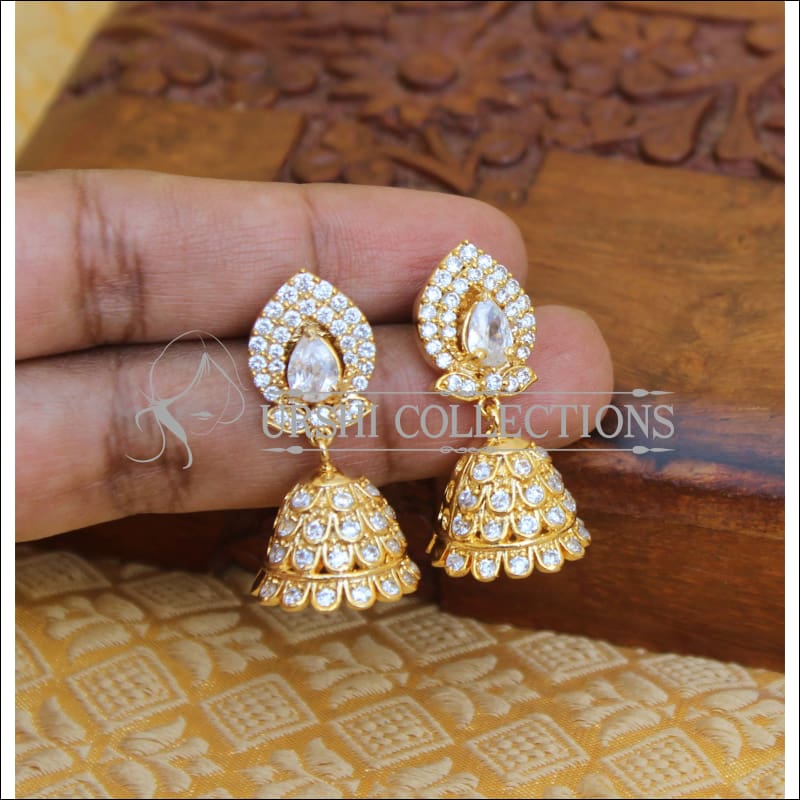 ER17822 AD White Stones Daily Wear Gold Covering Ear Studs South Indian  Jewellery | Gold earrings designs, Diamond earrings design, Tiny gold  earrings