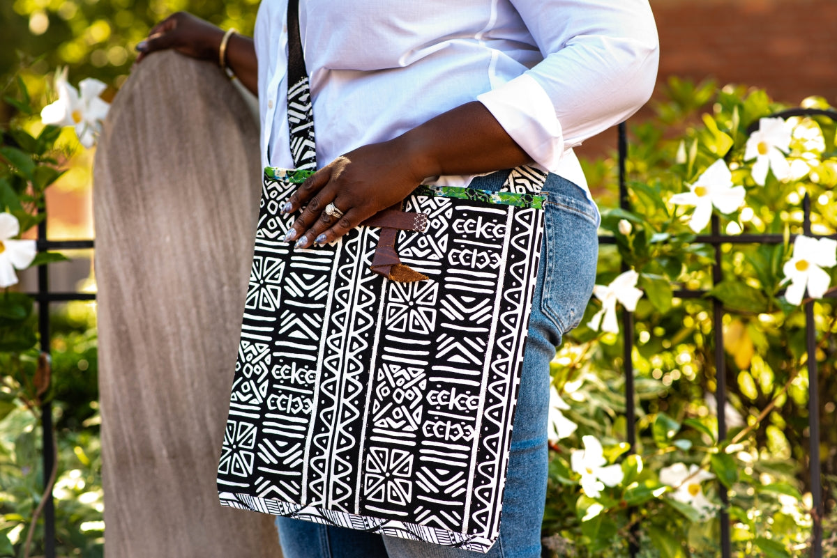 Black woman wearing african print large crossbody bag