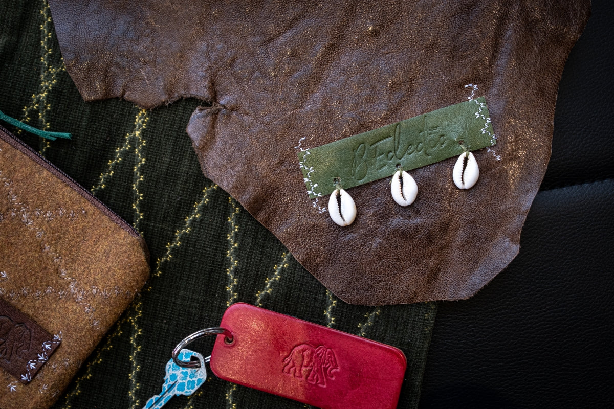 Crossbody Bag with leather flap and cowrie shells