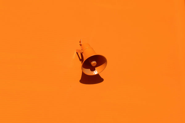orange megaphone - wake up call