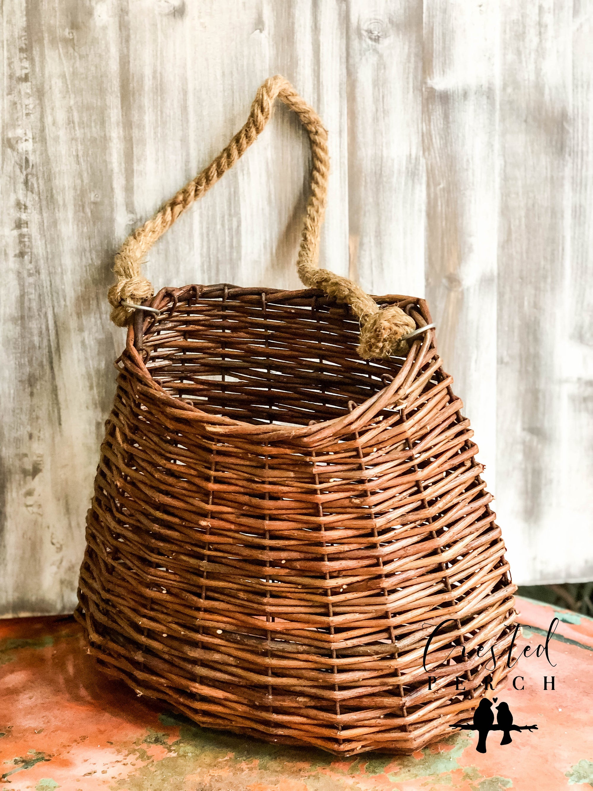 The Kenswick Brown Willow Hanging Wall Basket With Rope