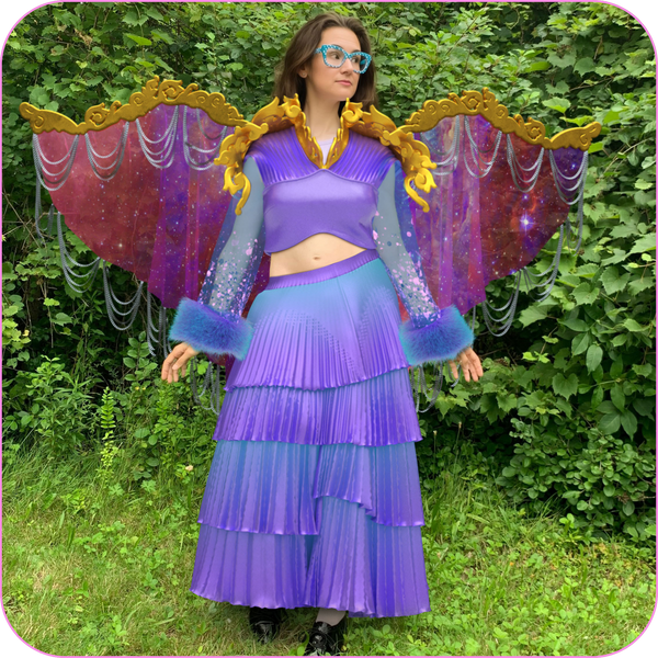 photo of a woman in a digital outfit that looks like something a woodland fairy would wear