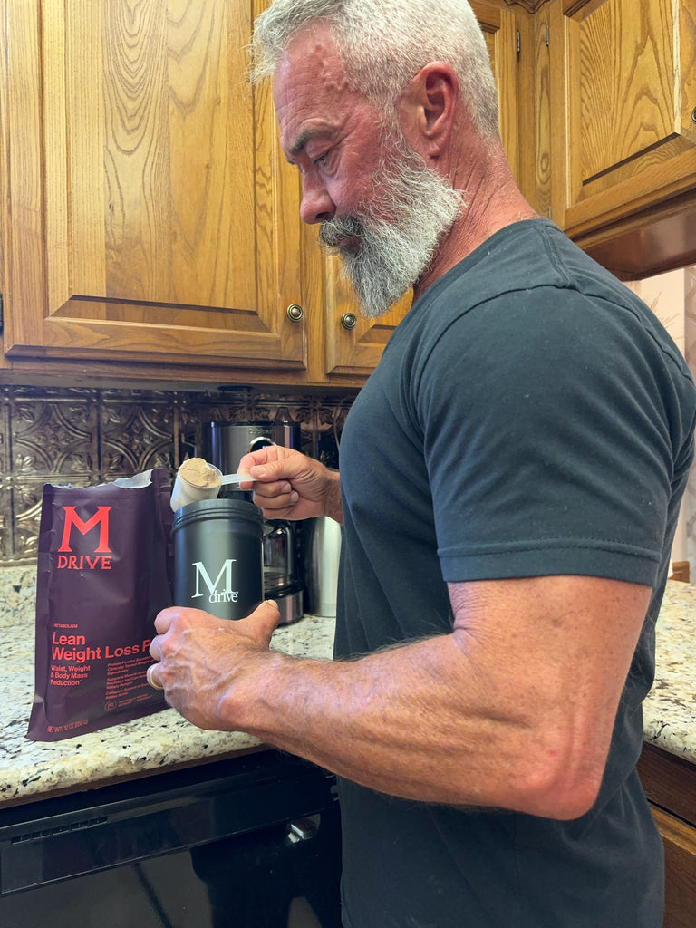 Man making protein shake for healthy snacks
