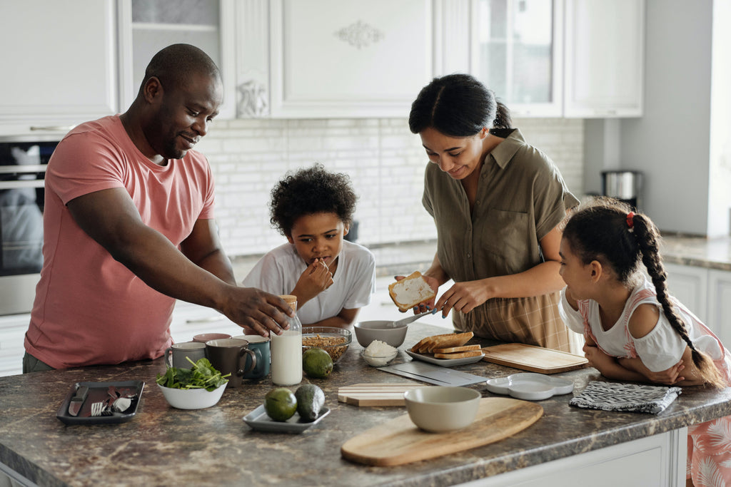 Family prepping a healthy meal together