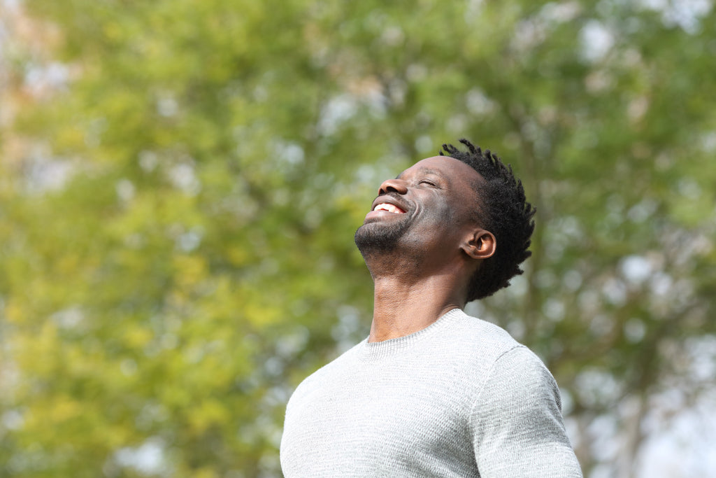 Man standing outside smiling