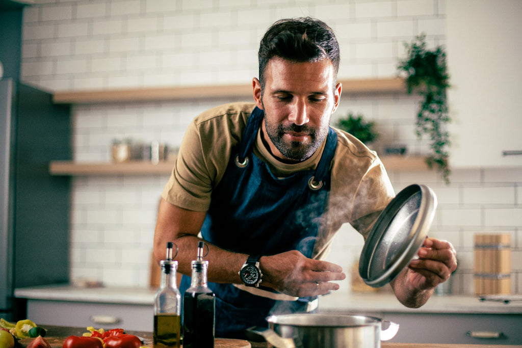 man cooking dinner