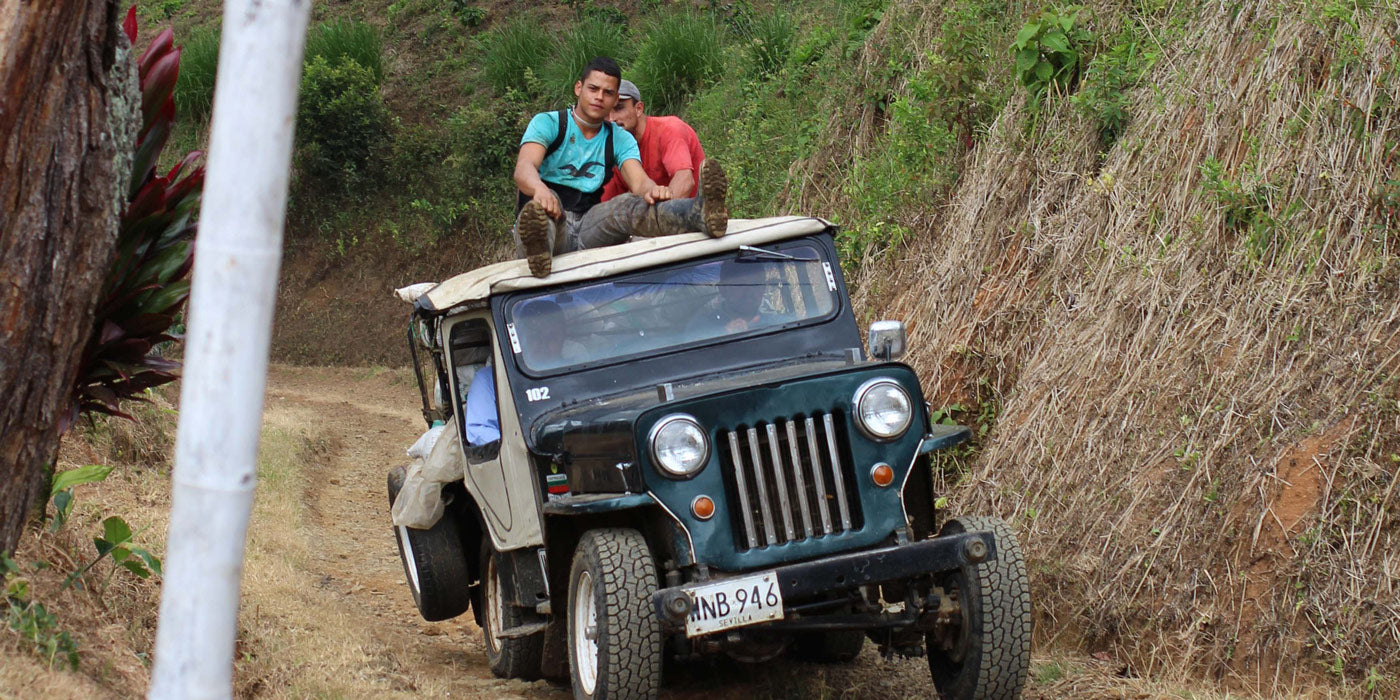 A jeep loaded with coffee at GLE’s first farm Finca Potosi