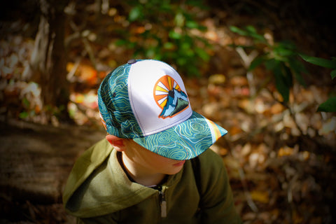 Kid wearing hiking hat