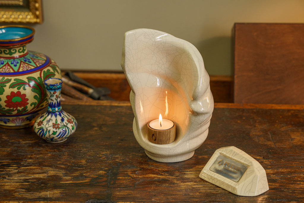 https://www.pulvisurns.com/products/light-handmade-keepsake-cremation-urn-for-ashes-color-craquelure-candle-holder