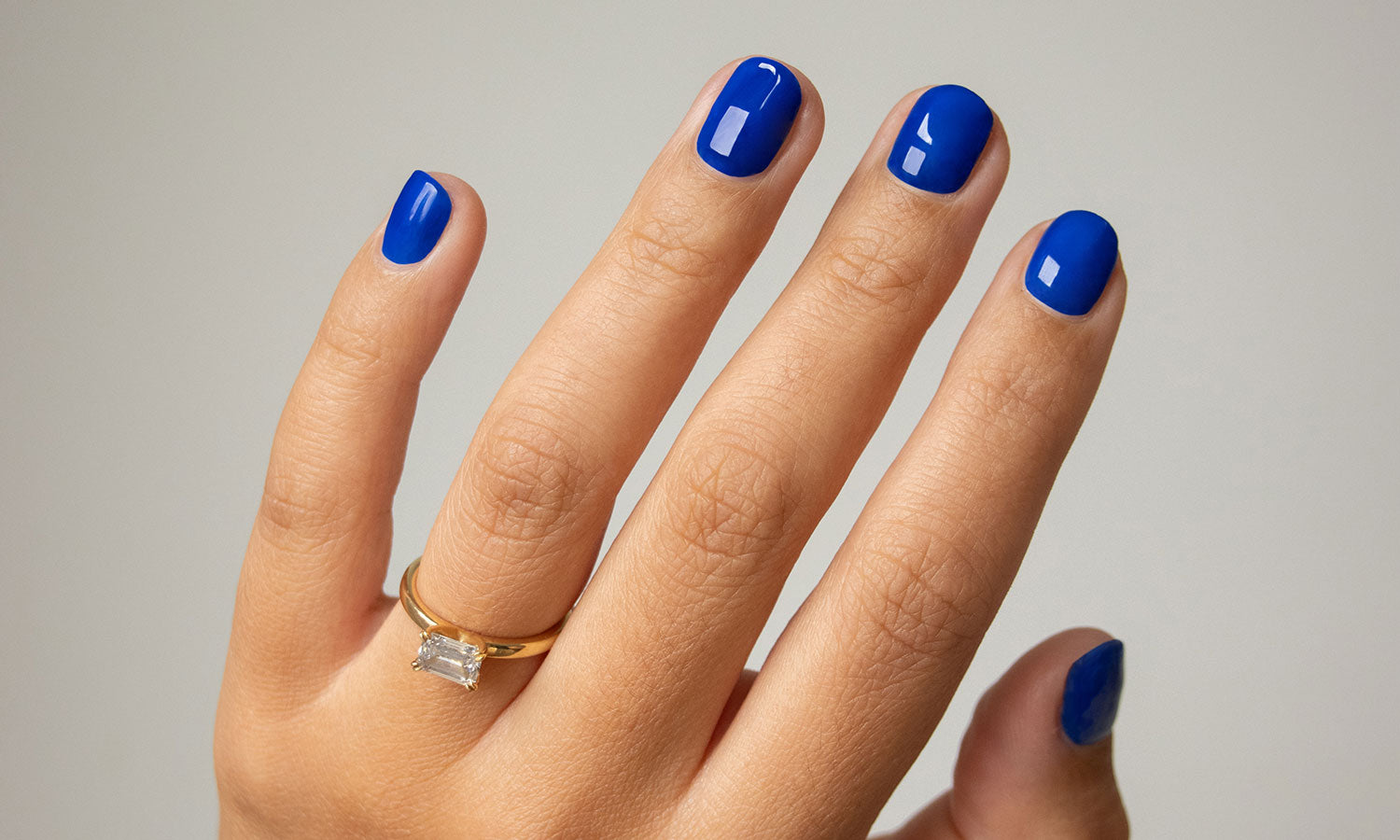 Gelous Cobalt Gel Nail Polish - photographed in United Kingdom on model