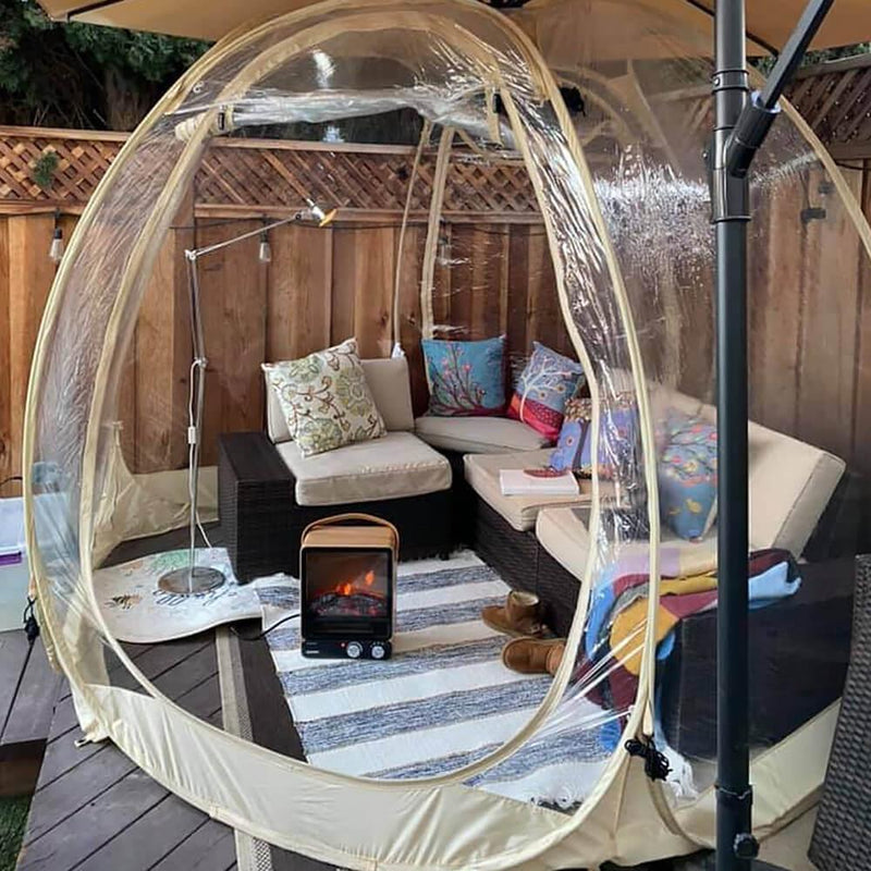 The alvantor gazebo is under a sun shelter unmbrella, with a outdoor couch and a heater in it.
