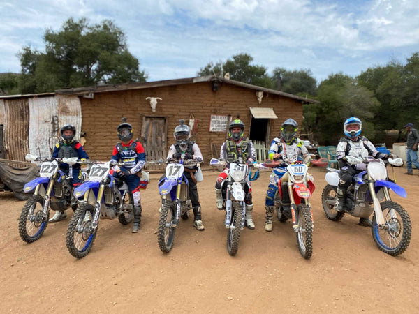 A group of dirt bikes getting ready to ride in Baja, Mexico.