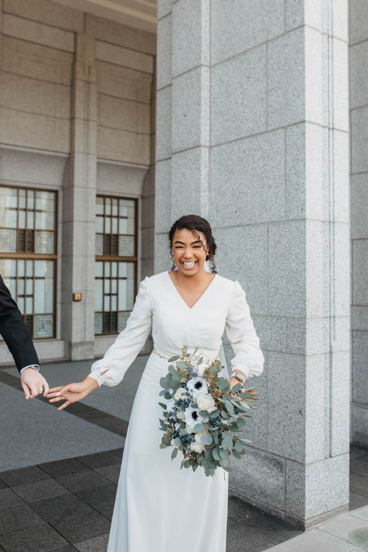 Long sleeve modest wedding dress from LatterDayBride, a modest wedding shop in Salt Lake City, Utah