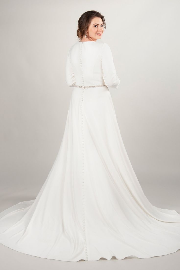 Long sleeve modest wedding dress from LatterDayBride, a modest wedding shop in Salt Lake City, Utah