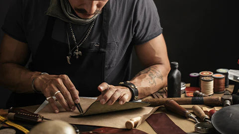 A Man measure and cutting the Full Aniline Top Grain Leather