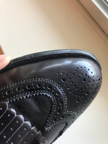 Wax Base on the toe cap of the loafer