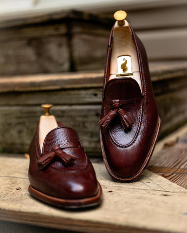 Ichigo Ichie Shoemaker from Japan remote bespoke tassel loafers made from replica reindeer leather, on corner of steps