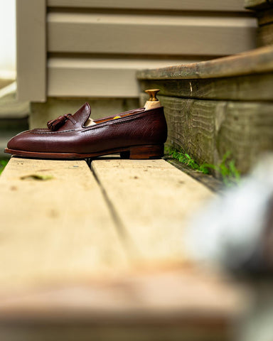 Ichigo Ichie Shoemaker from Japan remote bespoke tassel loafers made from replica reindeer leather, side-view on steps