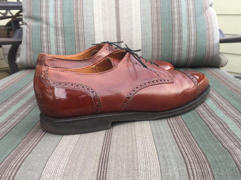 Side view of Allen Edmonds Benton Calfskin Derbies Mirror Shined using Lensing Black Wax