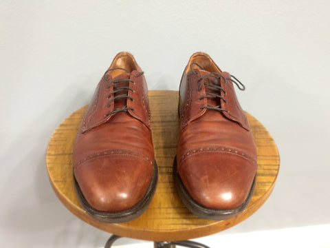 Pre-lensing a pair of Allen Edmonds Benton Walnut Calfskin Derbies from the front