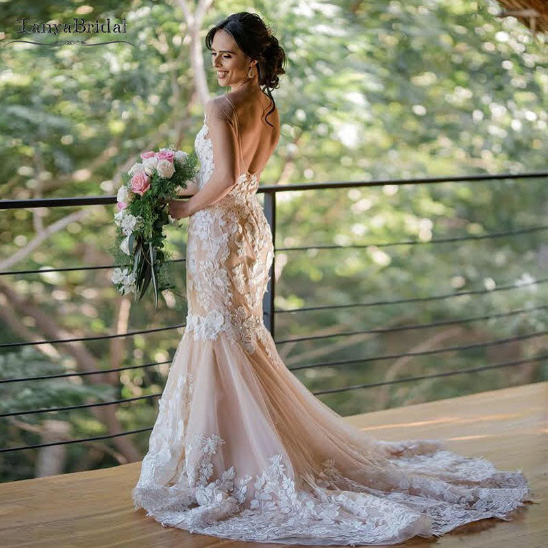 blush mermaid wedding dress