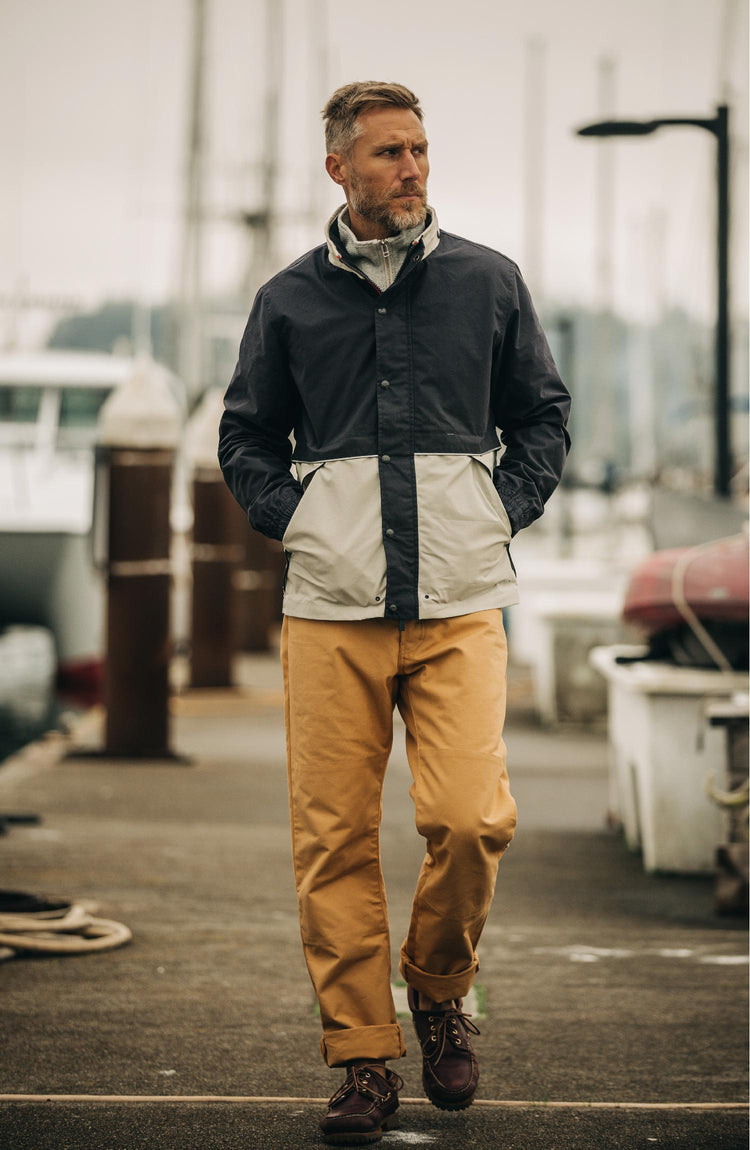 Model wearing The Navigator in Natural and Navy Color Block